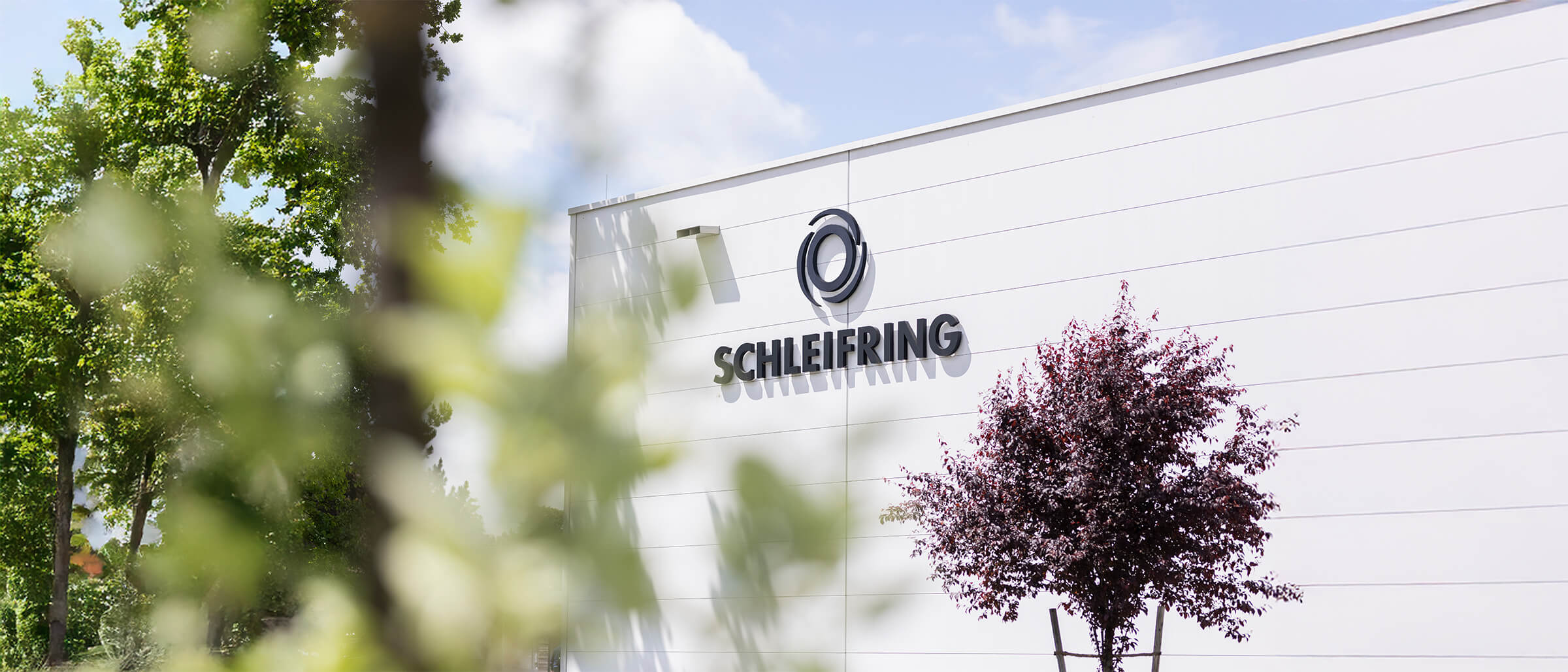 Exterior view of a SCHLEIFRING company building.