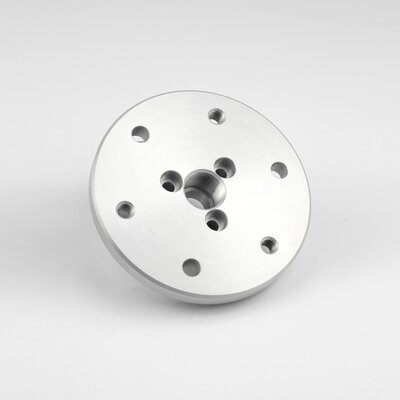 Product photo of a connection adapter on a white background.